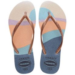 Japonki damskie Havaianas Slim Palette Glow. Brązowe klapki Havaianas, bez wzorów, z materiału, bez obcasa. Za 99.99 zł.