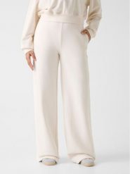 Guess Spodnie materiałowe 180561 Biały Slim Fit. Białe spodnie materiałowe Guess, s, z aplikacjami, z materiału. Za 295.00 zł.