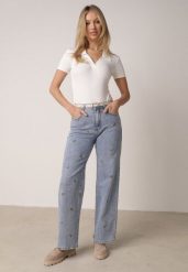 Niebieskie Jeansy z Bawełną o Szerokim Kroju z Wysokim Stanem Ozdobione Haftem Oslian. Niebieskie jeansy Born2be, l, bez wzorów, z podwyższonym stanem. Za 129.99 zł.