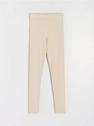 Prążkowane legginsy z gumką w pasie - kremowy. Białe legginsy Sinsay, l, bez wzorów, prążkowane. Za 29.99 zł.