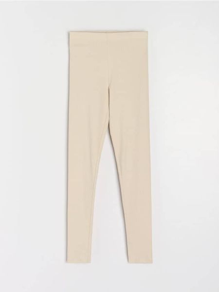 Prążkowane legginsy z gumką w pasie - kremowy. Białe legginsy Sinsay, l, bez wzorów, prążkowane. Za 29.99 zł.