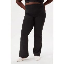 Damskie legginsy Girlfriend Collective. Czarne legginsy GIRLFRIEND COLLECTIVE, bez wzorów. Za 392.50 zł.