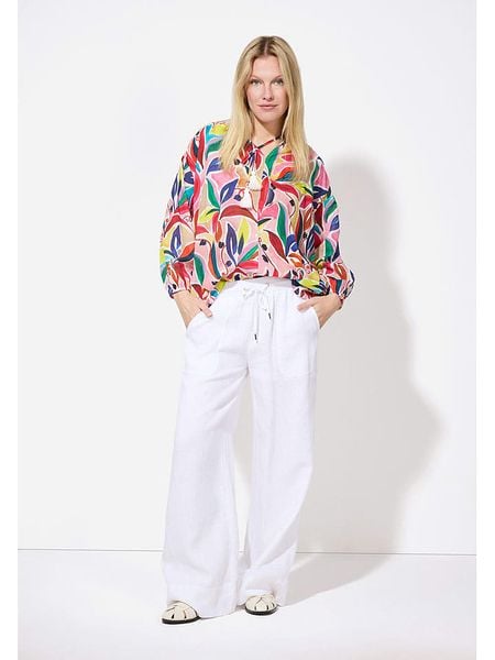 More & More Bluzka w kolorze różowym ze wzorem rozmiar: 38. Różowe bluzki More & More, bez wzorów, z bawełny, bez kołnierzyka, bez ramiączek. Za 129.95 zł.