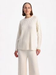 BGN Sweter w kolorze kremowym rozmiar: 34. Brązowe swetry BGN, bez wzorów, ze splotem, bez ramiączek. Za 107.95 zł.