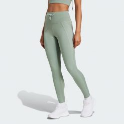 Legginsy Running Essentials. Zielone legginsy sportowe Adidas, xs, bez wzorów, z materiału, do biegania. Za 149.99 zł.