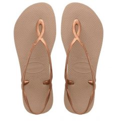 Sandały Havaianas Luna Premium II różowe. Czerwone sandały Havaianas, bez wzorów, z materiału, eleganckie, bez obcasa, bez zapięcia. Za 156.50 zł.