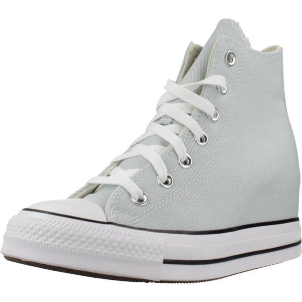 Buty CONVERSE CHUCK TAYLOR ALL STAR WEDGE Niebieski. Niebieskie trampki Converse, bez wzorów, z tkaniny, bez zapięcia. Za 368.99 zł.