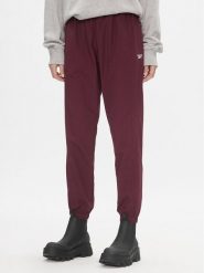 Reebok Spodnie dresowe Classics Franchise IL4627 Bordowy Relaxed Fit. Czerwone spodnie dresowe Reebok, m, bez wzorów, z dresówki. Za 159.99 zł.
