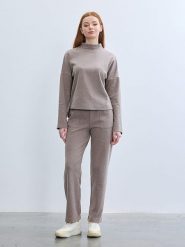 BGN Spodnie w kolorze szarobrązowym rozmiar: 40. Brązowe spodnie materiałowe BGN, na co dzień, bez wzorów, z materiału. Za 108.74 zł.