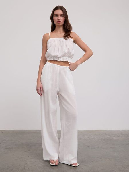 BGN Spodnie w kolorze białym rozmiar: 36. Białe spodnie materiałowe BGN, na imprezę, bez wzorów, z bawełny. Za 61.17 zł.