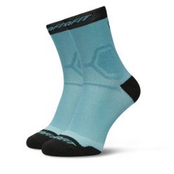 Skarpety wysokie unisex Dynafit. Niebieskie skarpety Dynafit, bez wzorów. Za 59.99 zł.