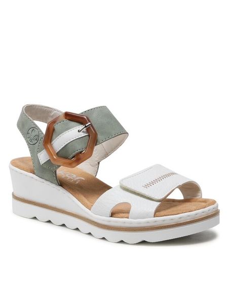 Rieker Sandały 67476-81 Biały. Białe sandały Rieker, bez wzorów, z materiału, bez obcasa, na koturnie, bez zapięcia. Za 259.99 zł.