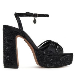Sandały Nine West. Czarne sandały Nine West, bez wzorów, bez obcasa, na słupku, bez zapięcia. Za 259.99 zł.