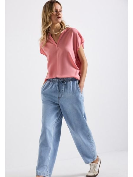 Street One Bluzka w kolorze jasnoróżowym rozmiar: 34. Różowe bluzki Street One, bez wzorów, z wiskozy, street, bez kołnierzyka, bez ramiączek. Za 82.99 zł.