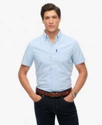 Superdry Oxford Short Sleeve Shirt – koszula Oxford krótki rękaw 100% bawełna. Niebieskie koszule Superdry, s, bez wzorów, z bawełny, casualowe, bez kołnierzyka, bez ramiączek. Za 279.65 zł.