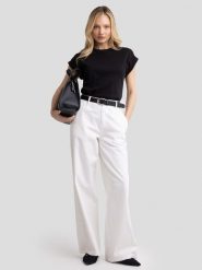 BIG STAR Koszulka w kolorze czarnym rozmiar: S. Czarne bluzki Big Star, s, bez wzorów, z bawełny, retro, bez kołnierzyka, bez ramiączek. Za 37.99 zł.