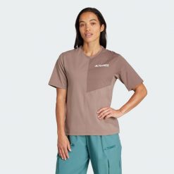 Koszulka Terrex Multi Climacool. Brązowe bluzki Adidas, xl, bez wzorów, sportowe, bez kołnierzyka, bez ramiączek. W wyprzedaży za 145.27 zł.