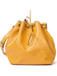 Louis Vuitton Torebka "Noe PM" w kolorze żółtym - 24 x 26 x 18 cm rozmiar: onesize. Żółte torby na ramię Louis Vuitton, bez wzorów, z materiału, na ramię, bez dodatków. Za 3,145.99 zł.