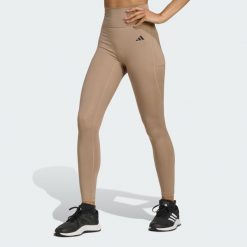 Legginsy 7/8 bez szwu z przodu Optime Essentials. Brązowe legginsy Adidas, xs, bez wzorów. Za 219.00 zł.