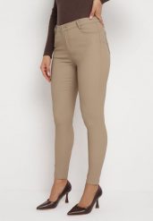 Beżowe Spodnie Skinny z Imitacji Skóry Awileda. Brązowe spodnie materiałowe Born2be, do pracy, l, bez wzorów, z jeansu, z podwyższonym stanem. Za 79.99 zł.