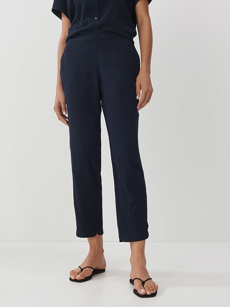 Someday Spodnie w kolorze granatowym rozmiar: 40. Niebieskie spodnie materiałowe someday., bez wzorów, z materiału, z podwyższonym stanem. Za 166.49 zł.