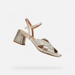 Sandały GEOX D GENZIANA MID Złoty. Szare sandały Geox, bez wzorów, ze skóry, bez obcasa, bez zapięcia. Za 469.99 zł.