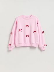 Bluza z kokardkami - różowy. Czerwone bluzy Reserved, l, bez wzorów, z bawełny, bez kaptura. Za 109.99 zł.