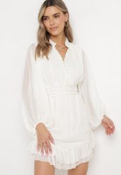 Beżowa Rozkloszowana Sukienka z Falbanką Harlin. Brązowe sukienki Born2be, m, bez wzorów, bez kołnierzyka, bez ramiączek, mini, rozkloszowane. Za 169.99 zł.