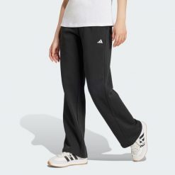 Spodnie Essentials Small Logo Feel Cozy Open-Hem. Czarne spodnie dresowe Adidas, bez wzorów, z polaru. Za 157.99 zł.
