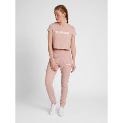 Damska koszulka crop top Hummel Legacy. Białe bluzki Hummel, m, bez wzorów, sportowe, bez kołnierzyka, bez ramiączek. Za 94.00 zł.