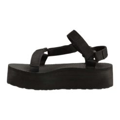 Sandały Teva Model W Flatform Univers Kolor Czarny. Czarne sandały Teva, bez wzorów, z materiału, bez obcasa, bez zapięcia. Za 230.00 zł.