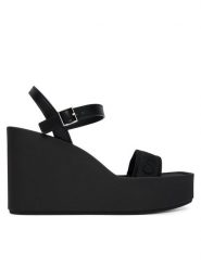 Calvin Klein Sandały Wedge 70 Sndl Webbing Lth HW0HW02882 Czarny. Czarne sandały Calvin Klein, bez wzorów, z materiału, bez obcasa, na koturnie, bez zapięcia. Za 449.99 zł.