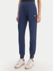 Guess Spodnie dresowe V4YB08 KCAY2 Granatowy Regular Fit. Niebieskie spodnie dresowe Guess, l, z aplikacjami, z dresówki. Za 349.99 zł.