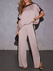 Milan Kiss Spodnie w kolorze szarobrązowo-czarnym rozmiar: L. Brązowe spodnie materiałowe Milan Kiss, l, bez wzorów, z materiału, z podwyższonym stanem. Za 130.99 zł.