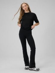 4F Legginsy z rozszerzanymi nogawkami damskie - czarne L. Czarne legginsy 4f, l, bez wzorów, z bawełny, z podwyższonym stanem. Za 129.99 zł.