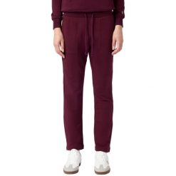 Spodnie damskie Champion Slim Pants. Czerwone spodnie materiałowe Champion, na co dzień, bez wzorów, z bawełny. Za 154.99 zł.
