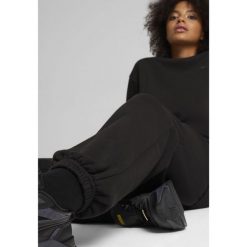 Spodnie dresowe unisex Essentials Elevated PUMA Black. Czarne spodnie dresowe Puma, m, bez wzorów, z dresówki, trekkingowe. W wyprzedaży za 179.00 zł.