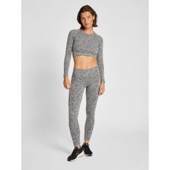 Damski bezszwowy crop top Hummel Mt Pi. Brązowe biustonosze Hummel, bez wzorów. Za 148.50 zł.
