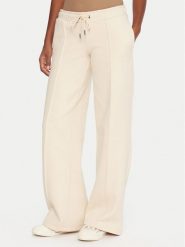 Guess Jeans Spodnie dresowe W5BB04 KC811 Beżowy Wide Leg. Brązowe spodnie sportowe Guess Jeans, xs, z aplikacjami, z bawełny. Za 349.99 zł.