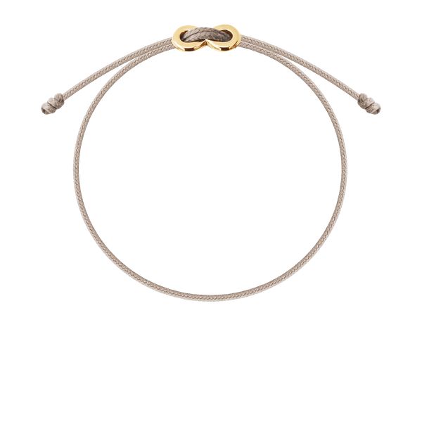 Bransoletka z pozłacanym zapięciem Infinity na cienkim beżowym sznurku. Brązowe bransoletki Lilou, pozłacane. Za 99.00 zł.