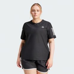 Koszulka Own The Run (Plus Size). Czarne bluzki Adidas, m, bez wzorów, z materiału, sportowe, bez kołnierzyka, plus size, bez ramiączek. W wyprzedaży za 104.30 zł.
