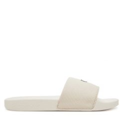 Klapki Calvin Klein Jeans. Klapki Calvin Klein Jeans, bez wzorów, z jeansu, bez obcasa. Za 129.99 zł.