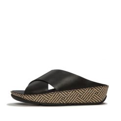 Damskie sandały na koturnie FitFlop Lulu Lux. Czarne sandały FIT FLOP, bez wzorów, z materiału, eleganckie, bez obcasa, na koturnie, bez zapięcia. Za 633.00 zł.