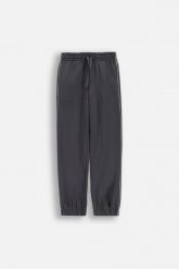 Spodnie dresowe z lampasami. Spodnie dresowe COCCODRILLO, bez wzorów, z dresówki. Za 99.90 zł.