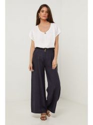 Lin Passion Lniane spodnie w kolorze granatowym rozmiar: 38/40. Niebieskie spodnie materiałowe Lin Passion, bez wzorów, ze lnu, z standardowym stanem. Za 130.99 zł.