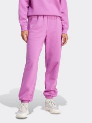 Adidas Spodnie dresowe w kolorze fioletowym rozmiar: L. Różowe spodnie dresowe Adidas, l, bez wzorów, z dresówki. Za 171.95 zł.