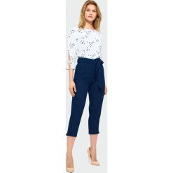 Spodnie o długości 7/8. Szorty Greenpoint, bez wzorów, z poliamidu. Za 59.99 zł.