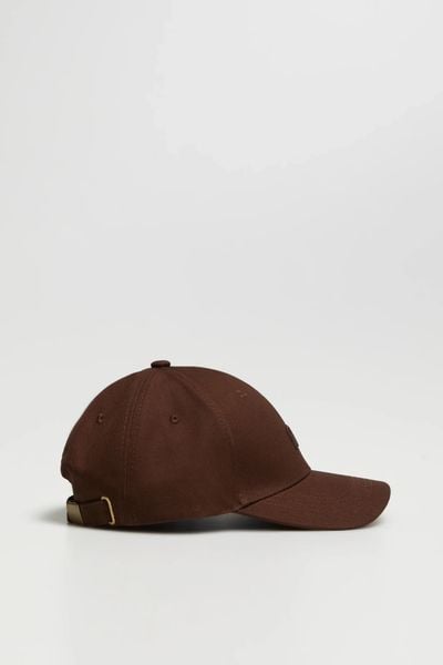 Czapka z daszkiem brązowa. Brązowe czapki MOODO, bez wzorów, z bawełny. W wyprzedaży za 39.99 zł.