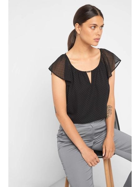 Orsay Koszulka w kolorze czarnym rozmiar: S. Czarne bluzki Orsay, s, bez wzorów, bez kołnierzyka, bez ramiączek. Za 31.95 zł.