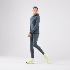 Legginsy do biegania damskie Kiprun Run 500 Warm ocieplane. Zielone legginsy KIPRUN, l, bez wzorów, z elastanu. Za 139.99 zł.
